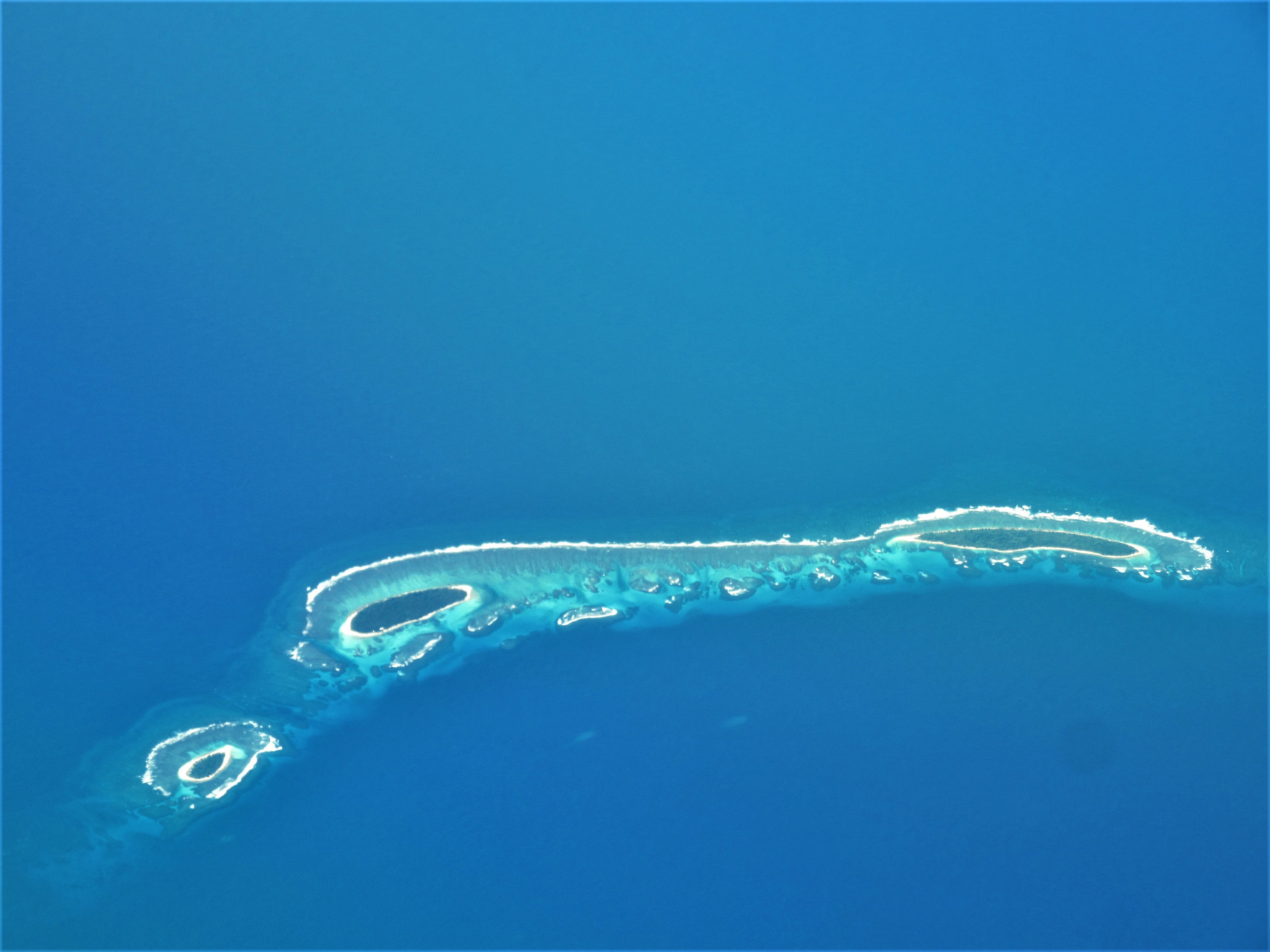 Atoll in the Pacific Ocean seen from the plane