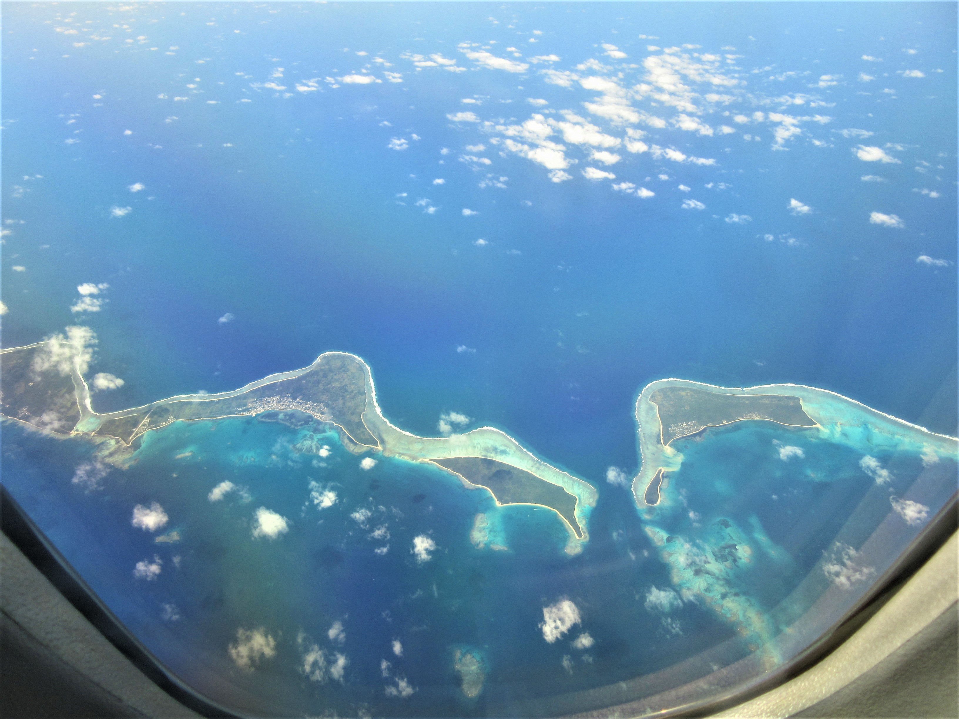 Pacific islands seen from a plane window